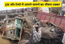 Head-on collision between a truck and a tempo.